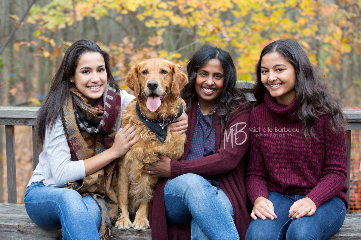 mom with daughters and dog