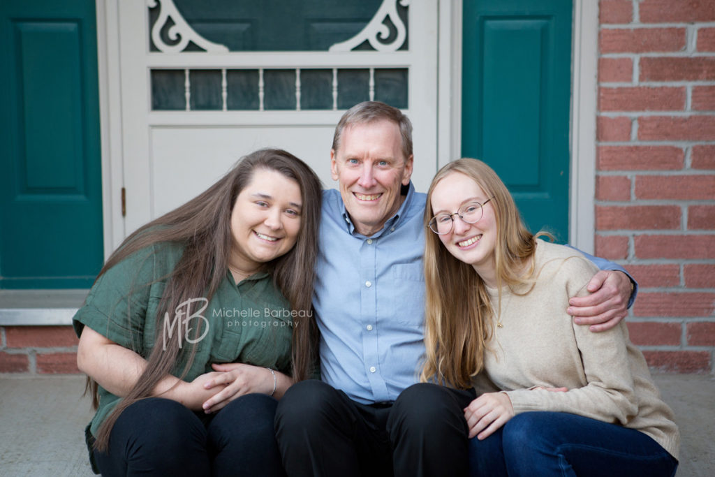 Father with adult daughters