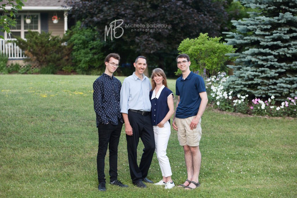 Dunrobin family in front of house