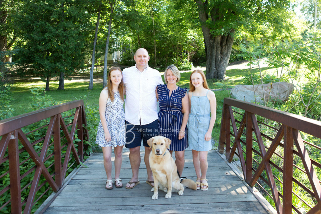 family of 4 with dog