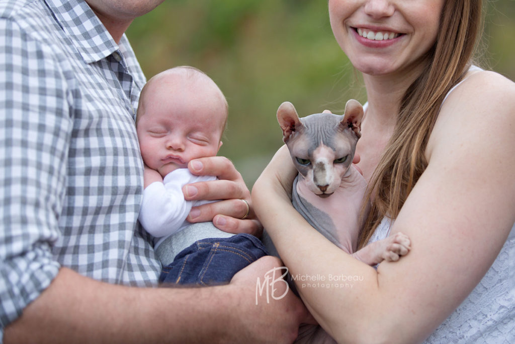 newborn with cat